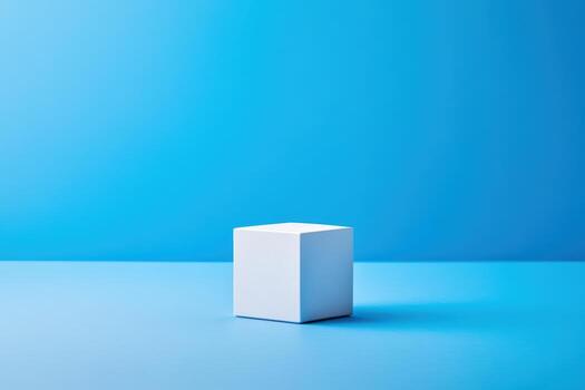 White cube standing alone on a vibrant blue background showcasing simplicity photo
