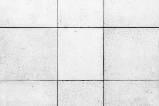 Concrete tiles arranged in a grid pattern with a minimalist aesthetic photo