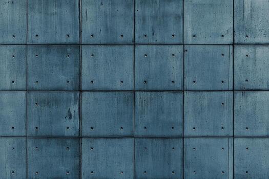Textured concrete wall with a grid pattern in urban architecture photo