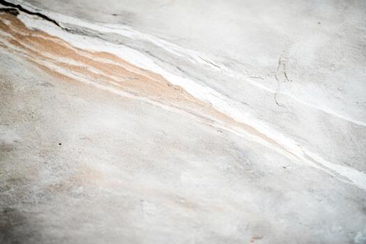 Natural textures create abstract patterns on stone surface in daylight photo