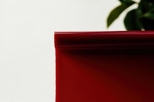 Bright red object against a neutral background in a modern setting photo