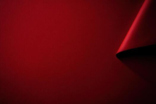 Bold red background with rolled paper creating a minimalistic aesthetic photo