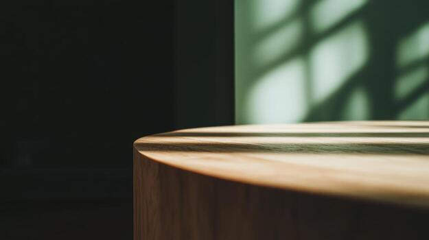 Elegant wooden table capturing light patterns in a modern interior photo