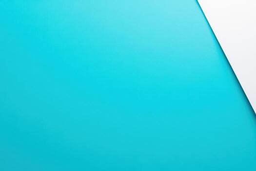 Bright teal backdrop with a white corner creating a modern aesthetic photo