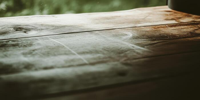 Natural wooden table surface with texture and soft morning light photo