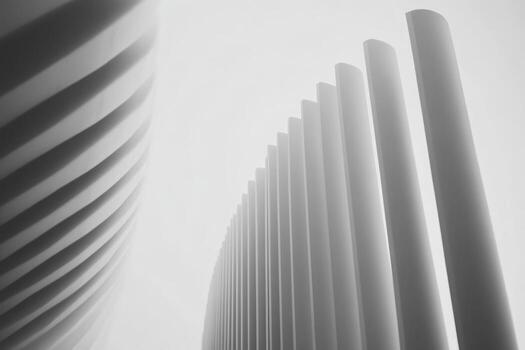 Unique architectural structures with curved and straight lines in monochrome photo