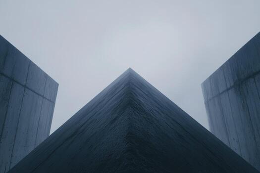 Unique architectural design showcasing a pyramid shape in a foggy environment photo