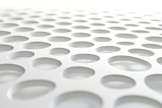 Intricate pattern of perforated material showcasing design and texture photo