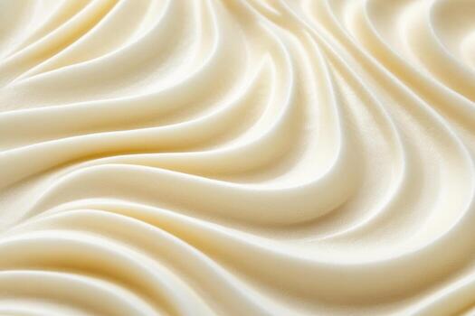 Silky cream colored fabric draping elegantly on a surface photo