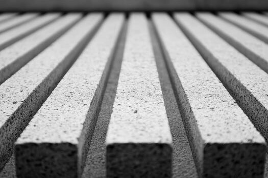 Concrete slabs arranged in parallel lines create a modern architectural texture photo