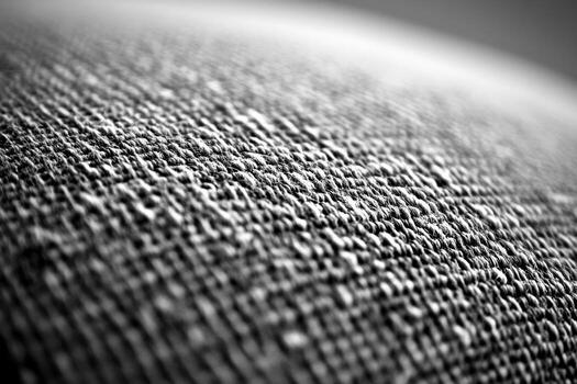 Close-up view of textured fabric highlighting intricate weave patterns photo