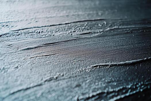 Textured surface with intricate lines and patterns in soft lighting photo