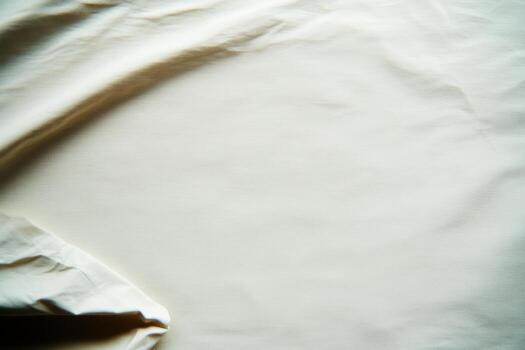 Textile fabric laid out on a surface for design work in natural light photo