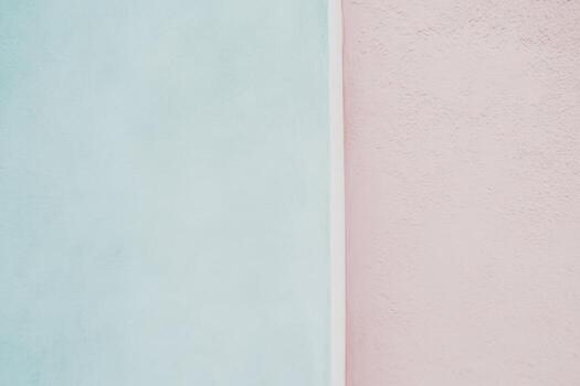 Beautiful pastel wall texture in urban setting with soft colors photo