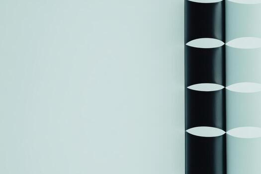 Modern architectural design featuring contrasting cylindrical elements on wall photo