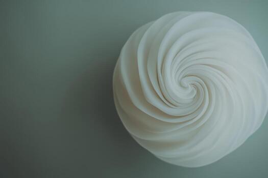 Beautifully crafted swirl of soft material on a calming surface photo