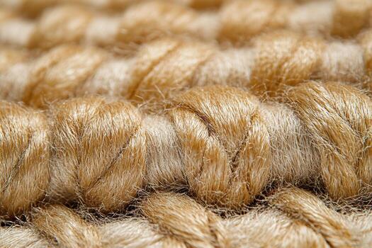 Textured close-up of natural rope showcasing intricate fibers and twists photo