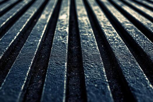 Unique texture of metal surface with parallel lines in dim lighting photo