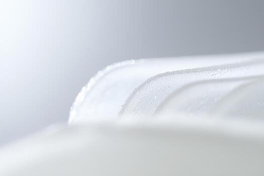 Close-up view of delicate melted ice formations on a smooth surface photo