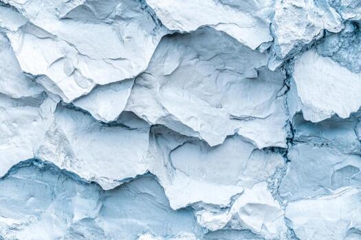 Textured blue wall with rugged layers resembling crumpled paper or ice photo