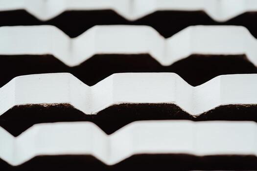 Unique textured surface with alternating peaks and valleys in close view photo