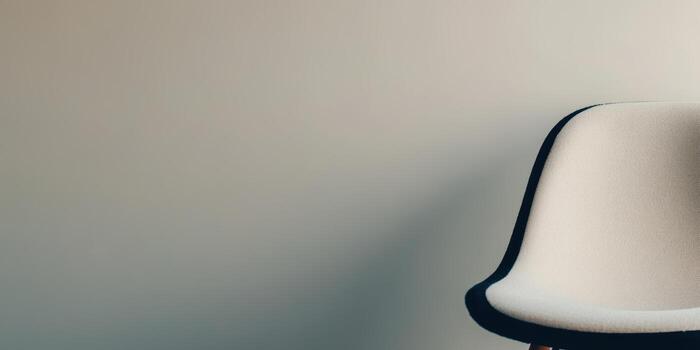 Modern chair design in simple indoor setting with neutral colors photo