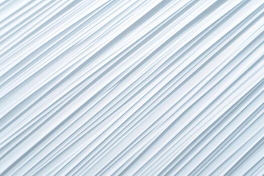 Textured surface with diagonal lines in light tones creates a minimal aesthetic photo