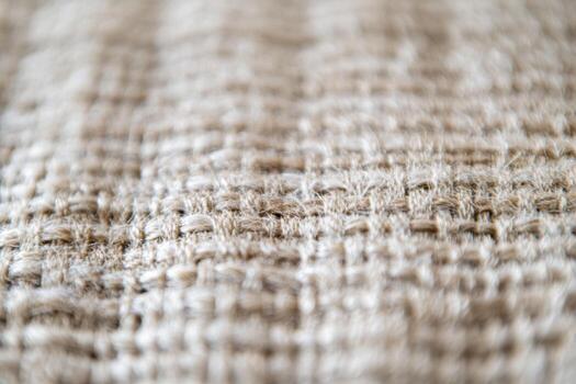 Textile featuring intricate patterns in natural fibers on a soft backdrop photo