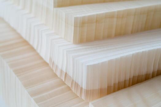 Wooden layers stacked in a clean workshop exhibit craftsmanship and precision photo