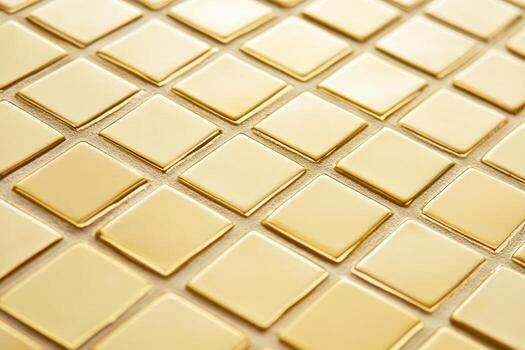 Ceramic tiles arranged in a geometric pattern in warm yellow color photo