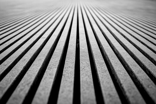 Vertical lines create a mesmerizing pattern on a concrete surface photo