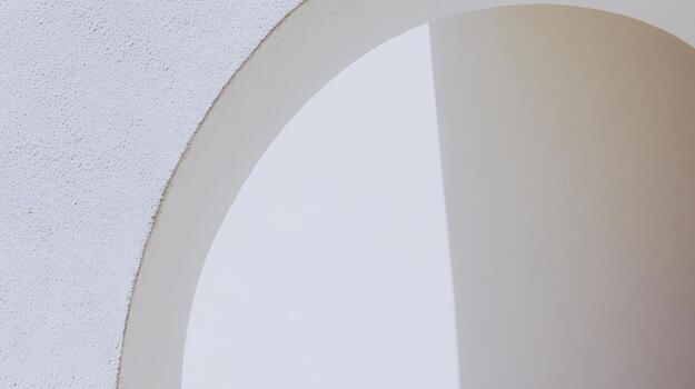 Architectural detail showcasing curves and light patterns in modern design photo