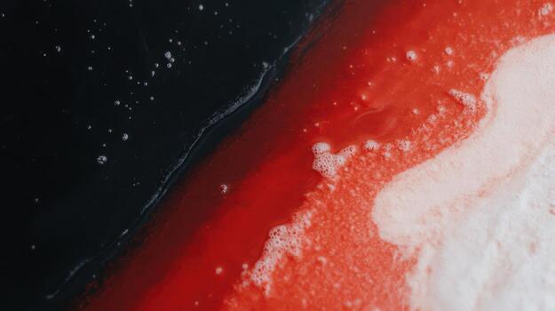 Colorful abstract composition of red, black, and white textures in liquid form photo