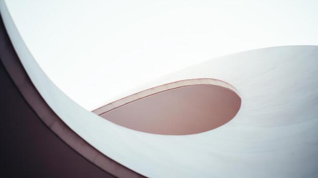 Architectural curves and lines create stunning visual harmony outdoors photo