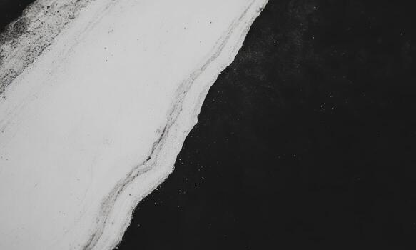 Abstract black and white texture with a flowing line on the surface photo