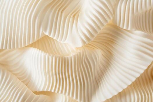 Soft cream-colored fabric with delicate pleats creates elegant texture photo