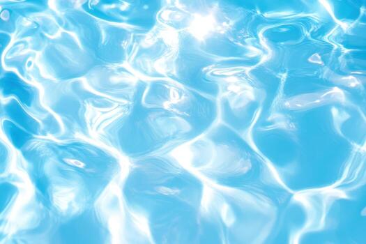 Sunlight glimmers on clear water surface in tranquil blue pool photo