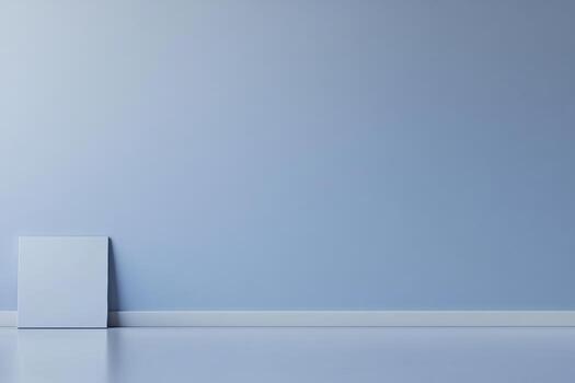 Simple blue wall with a square panel on the floor in a minimal setting photo