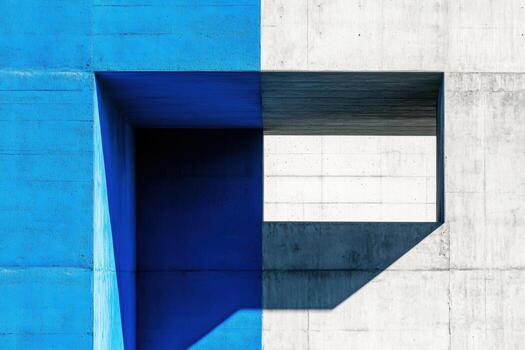 Abstract geometric wall design with bold blue and gray contrast in urban setting photo