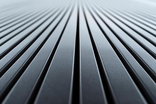 Long rows of sleek metal stripes create a modern and industrial texture photo