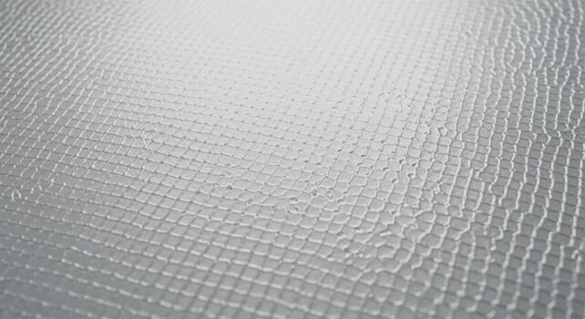 Abstract textured surface with a subtle pattern and gradient light. photo