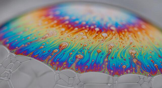 Close-up view of a colorful soap bubble with intricate patterns. photo