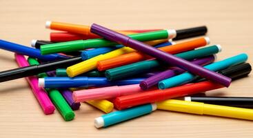 Colorful Markers on a Table - A Vibrant Collection for Creative Projects. photo