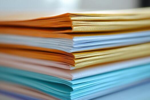 Stack of papers on a desk photo