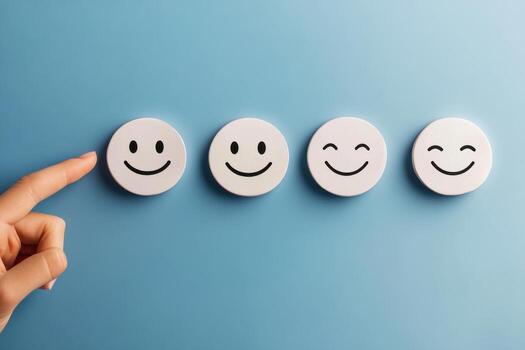 Choosing a smiley face for satisfaction photo