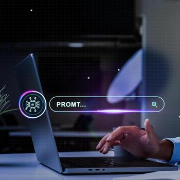 User interacts with a laptop displaying a digital search bar for prompt-related inquiries in a modern workspace photo