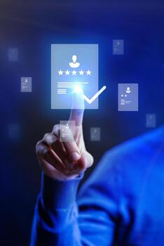 User interacts with digital interface to select five-star feedback during online review process in a tech environment photo