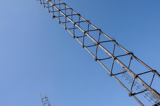 Infrastructure using rebar tied to form a concrete pillar core. photo