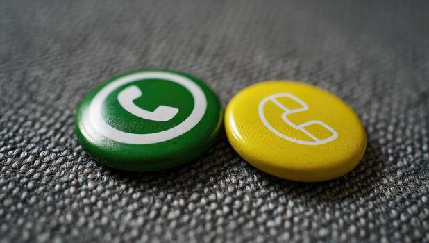 Two buttons with the word whatsapp on them photo