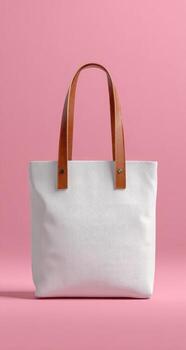 White canvas tote bag mockup on pink background photo